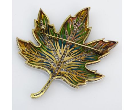 Approx. 1.10 Carat Pave Set Diamond, Enamel and 18 Karat White and Yellow Gold Maple Leaf Brooch. Stamped 750. Very good cond