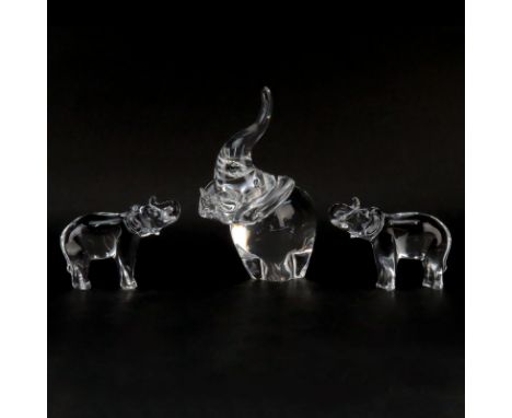 Three (3) Crystal Elephant Figurines. Includes: Steuben crystal trunk up figurine, and two baccarat crystal figurines. All si