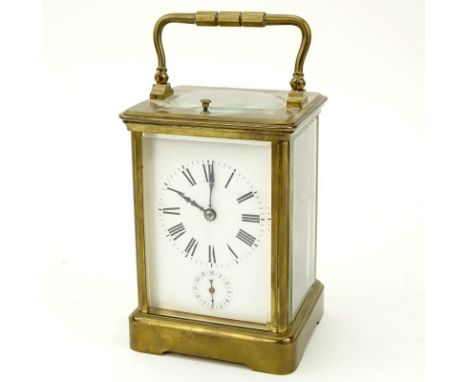 Late 19th Century French Aiguilles Gilt Brass Carriage Clock. Porcelain dial with double display, Roman and Arabic numerals. 