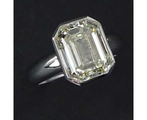 Approx. 5.0 Carat Emerald Cut Diamond and 18 Karat White Gold Engagement Ring. Diamond J-K color, VS2 clarity. Stamped 18K. V