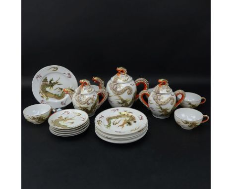 Vintage Nineteen (19) Piece Japanese Chikusa Porcelain Hand painted Moriage Style  Tea Set. Includes: Tea pot 8" H, creamer, 