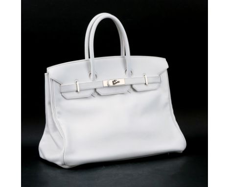 Hermès White Swift Leather Birkin 35 Bag. Palladium hardware. Interior with zipper and slot pocket. Clochette, keys and lock 