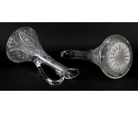 Pair of Vintage Cut Crystal Ewers. Unsigned. One ewer has a chip and crack to handle, needs cleaning. Measures 15-1/4" H. Shi