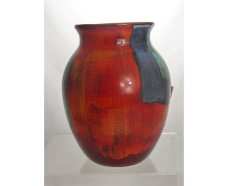 A Poole Pottery Vase Ceramic with blue and red glaze and factory marks to base, approx 27 cms high. 