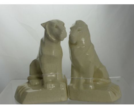 Two Antique White Ceramic Lion Figures (glaze crackled) approx 7.5 cms high.