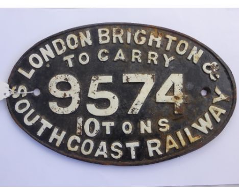 A Vintage Cast Iron Steam Engine Oval Plaque. London, Brighton and South Coast Railway, No. 9574 to carry 10 tons, 37 x 23 cm