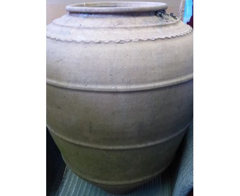 A Large Vintage Terracotta Portuguese Olive Oil Amphora 63 cms high 155 cms girth. 