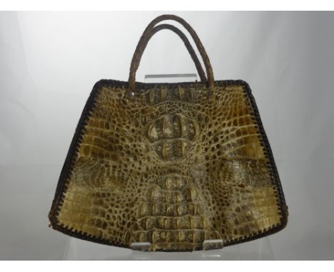 A Vintage Alligator Hand Bag, hand stitched.