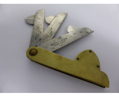 An Antique Brass Blood Letting Fleem with three stainless steel blades, Turn R & Co Suffolk Works.