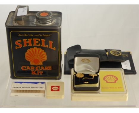 A Quantity of Shell Memorabilia. including a pack of playing cards, small magnifying glass, a box of cufflink's, a pewter gob