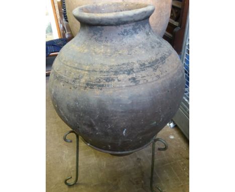 A Large Vintage Terracotta Portuguese Olive Oil Amphora 80 cms high 213 cms girth.