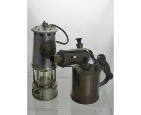 A Vintage Miner's Lamp, type 6, Protector Lamp & Lighting by Eccles, Manchester, together with a brass halogen paraffin blow 