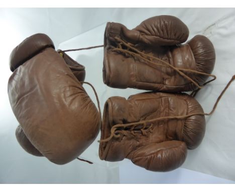 Two Pairs of Vintage Leather Boxing Gloves.
