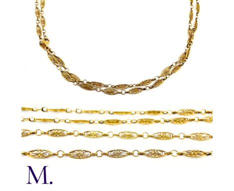 The 18ct yellow gold sautoir / long guard chain is marked with the French control mark for 18ct gold.Weight: 29.0g Size: 108c