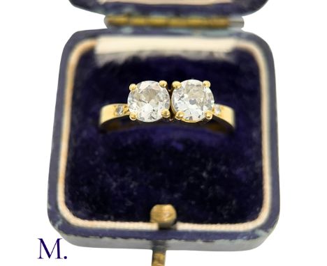 The 2-stone diamond ring in 18ct yellow gold is set with two round cut diamonds of approximately 1.0ct each.Box not included;