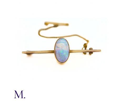 The 9ct yellow gold brooch is set with a good colour opal cabochon (approx. 12 x 7mm).Box not included; for display only.Size