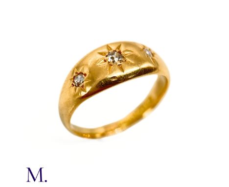 The gypsy ring is set with three small diamonds. The band is hallmarked for 18ct gold and dated 1919.Box not included; for di