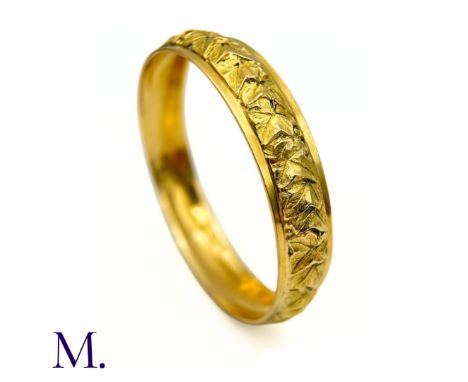 The Art Nouveau 18ct yellow gold bangle is made by French goldsmith Charles Georges who worked in Paris in the late 19th and 