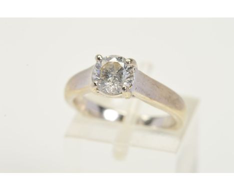 A FRACTURE FILLED SINGLE STONE DIAMOND RING, designed as a single brilliant cut diamond within a four claw setting to the pla