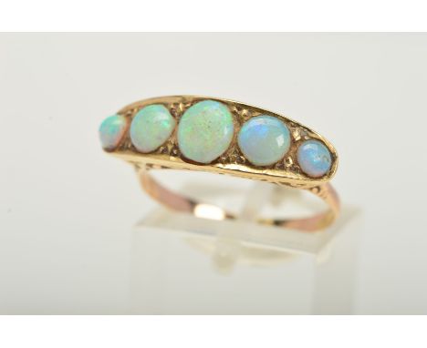 A FIVE STONE GRADUATED OPAL RING, scroll design sides, ring size Q, unmarked, tested as approximately 9ct gold, approximate g