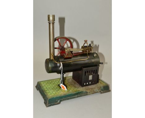 AN UNMARKED LIVE STEAM ENGINE, not tested, black painted horizontal boiler driving a single cylinder engine and a flywheel, w