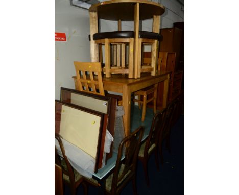 A LIGHT OAK CIRCULAR DINING TABLE and four stools together with a beech table, two chairs, rectangular glass top table, four 