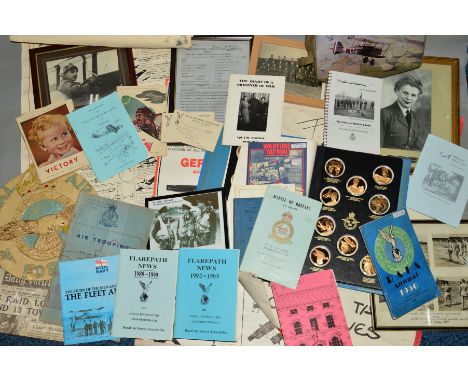 A LARGE BOX CONTAINING A LARGE NUMBER OF RAF RELATED MILITARY ITEMS, to include reproduction posters, several framed photos o