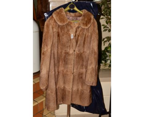 A LIGHT BROWN FUR JACKET, with 'George Rose, Derby' label, together with various fur stoles including one with head, legs and