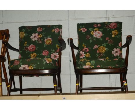 A PAIR OF DARK ERCOL WINDSOR ARMCHAIRS