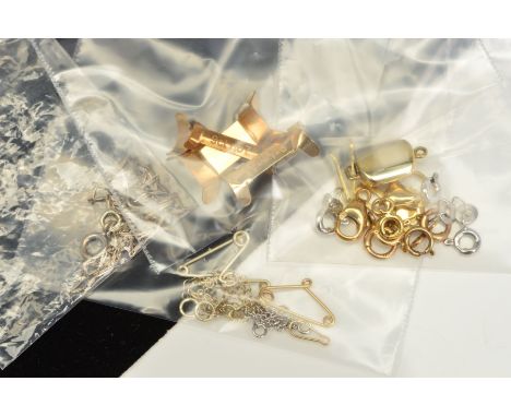 A SELECTION OF JEWELLERY PARTS AND FITTINGS, to include four ring clips, all stamped 9ct, three brooch safety chains, believe