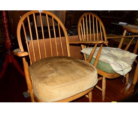 A PAIR OF ERCOL 1960'S BLONDE ELM SPINDLE BACK WINDSOR ARMCHAIRS (heavy wear and staining, frames solid)