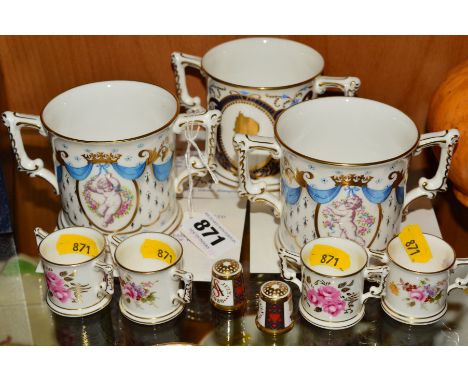 A GROUP OF ROYAL CROWN DERBY, to include three limited edition loving cups 'Welcome The First Child of T.R.H The Prince and P