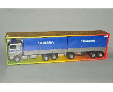 A BOXED EMEK-MUOVI OY PLASTIC SCANIA DRAW BAR UNIT AND TRAILER, No.40060 (1590362), 1/25 scale, box still sealed in original 