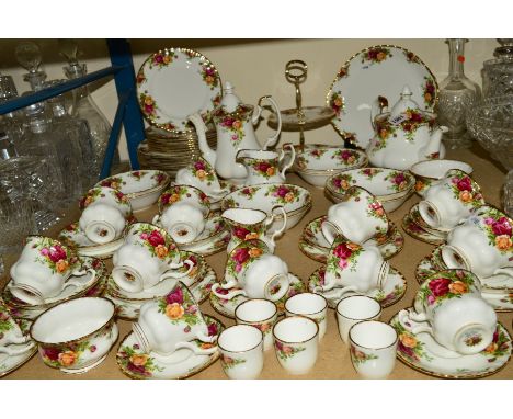 ROYAL ALBERT 'OLD COUNTRY ROSES' TEA, COFFEE AND DINNERWARE, including large teapot, coffee pot, seven tea cups, saucers and 