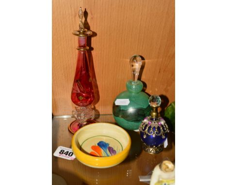 CLARICE CLIFF FOR WILKINSON LTD, a small 'Crocus' pattern dish, diameter 9cm, together with three glass/novelty scent bottles
