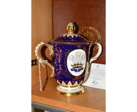 A BOXED LIMITED EDITION ROYAL CROWN DERBY COVERED TWIN HANDLED VASE/LOVING CUP, to celebrate 'The Marriage of HRH The Prince 