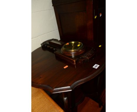 AN EDWARDIAN MAHOGANY CENTRE TABLE and an oak aneroid barometer (2)