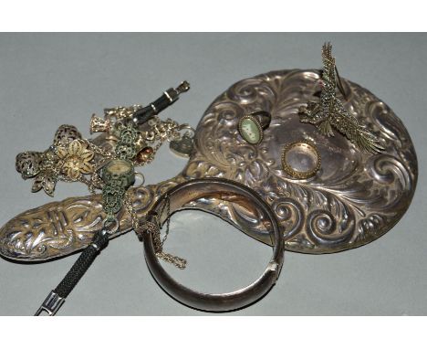 A SILVER HAND MIRROR AND A SELECTION OF SILVER AND WHITE METAL JEWELLERY, the hand mirror with embossed scrolling foliate dec