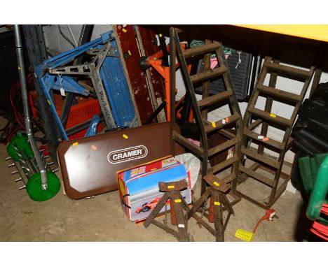 A PAIR OF CAR RAMPS, AXLE STANDS, EUROLIINE BATTERY CHARGER, set of black step ladders, small sack truck, work mate, tree lop