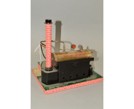 AN UNMARKED LIVE STEAM ENGINE, not tested, copper horizontal boiler driving a single cylinder engine and flywheel, with burne