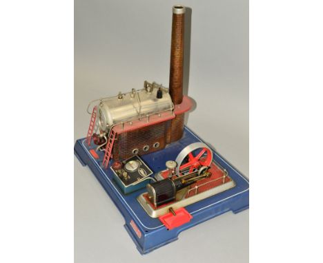 AN UNBOXED WILESCO D24 LIVE STEAM ENGINE, not tested, boiler driving a single engine, flywheel and steam regulator, appears c