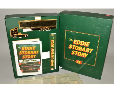 A BOXED CORGI CLASSICS THE EDDIE STOBART STORY SET, No.CC86610, complete with 1/64 scale gold plated model Scania Curtainside