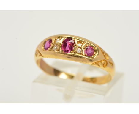 A GOLD EDWARDIAN DIAMOND AND RUBY HALF HOOP RING, ring size P 1/2, partial hallmark visible for Birmingham 1903, approximate 