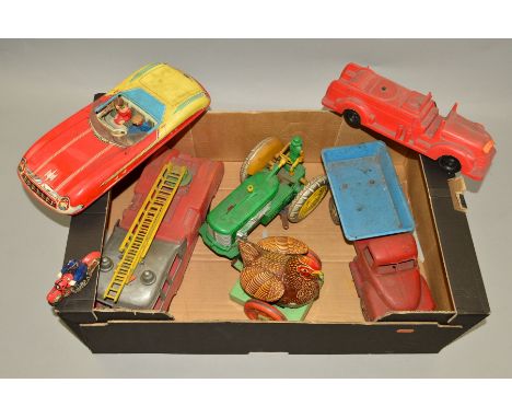 A QUANTITY OF TINPLATE, PLASTIC AND BATTERY OPERATED TOYS, majority in playworn condition and have some damage/missing items,