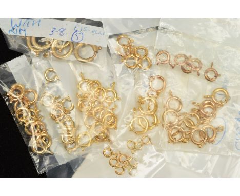 A SELECTION OF BOLT RING CLASPS, approximate diameters 5mm to 12mm, most with marks to indicate 9ct gold, approximate total w