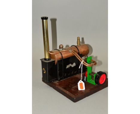AN UNMARKED LIVE STEAM ENGINE, not tested, copper horizontal boiler driving a single cylinder engine and flywheel, with burne