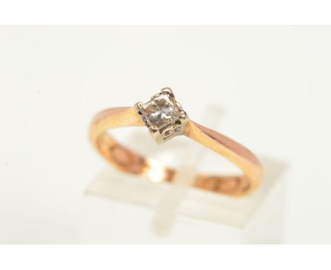 AN 18CT GOLD CLOGAU DIAMOND RING, designed with a single princess cut diamond within a four claw setting to the tapered shoul