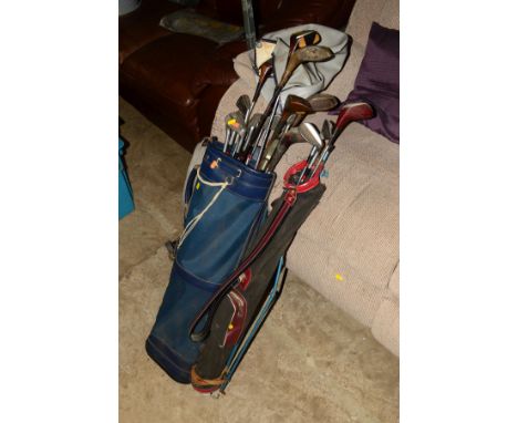 TWO VINTAGE GOLF BAGS with golf clubs including Slazenger and Doral (2)