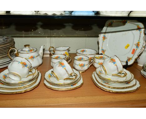 ROYAL ALBERT CROWN CHINA TEASET, Rd No769616, to include teaport (chipped inside), cake plate (staining), milk jug, sugar bow