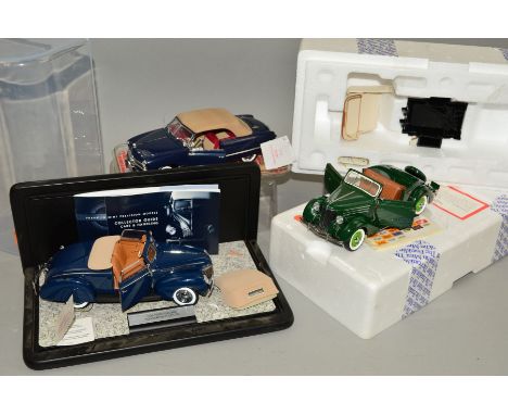 A BOXED FRANKLIN MINT 1936 FORD COUPE, 1/24 scale, appears complete and to have hardly ever been removed from its box, with a